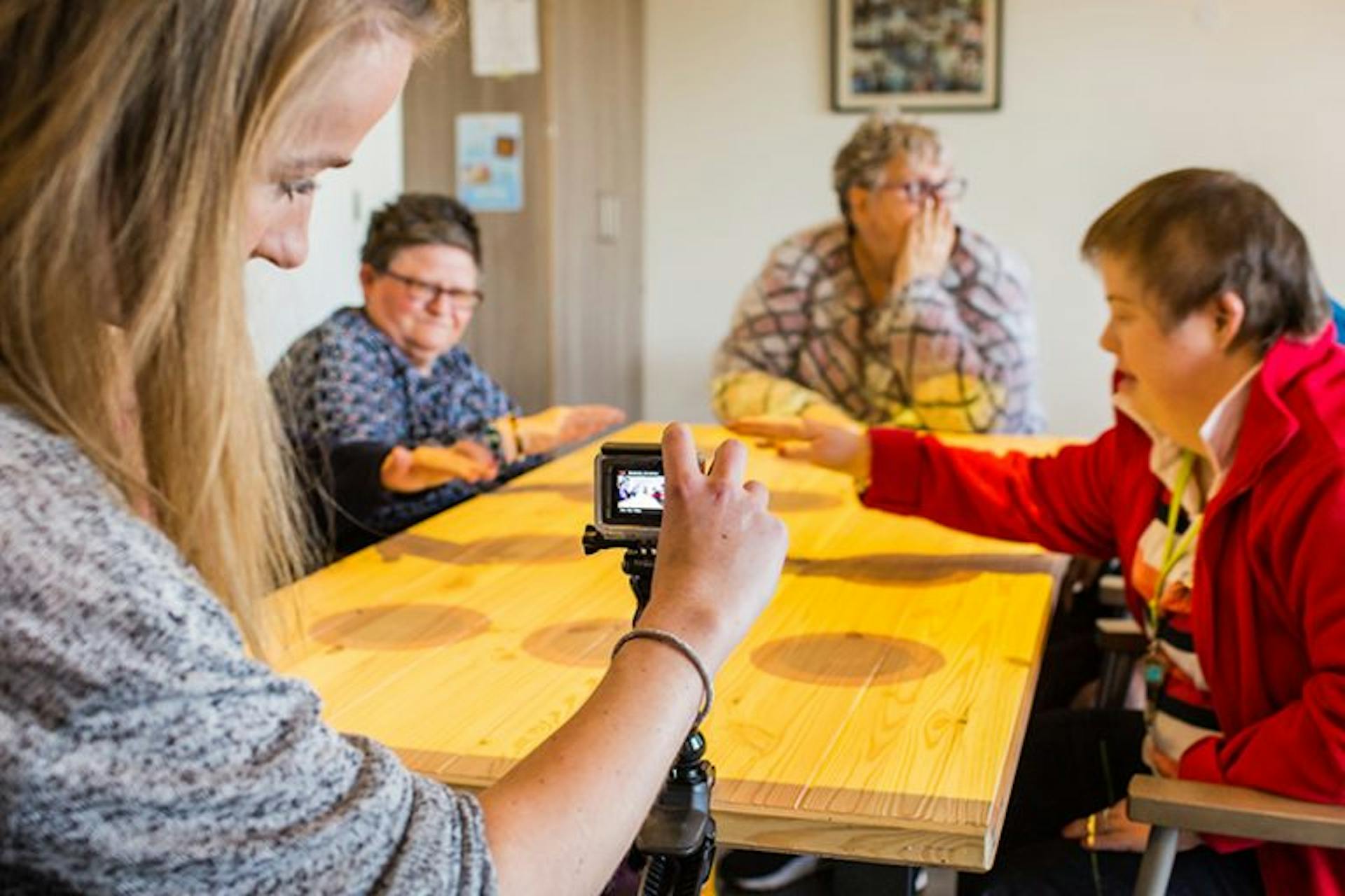 Fotograaf die foto's maakt bij Tovertafel